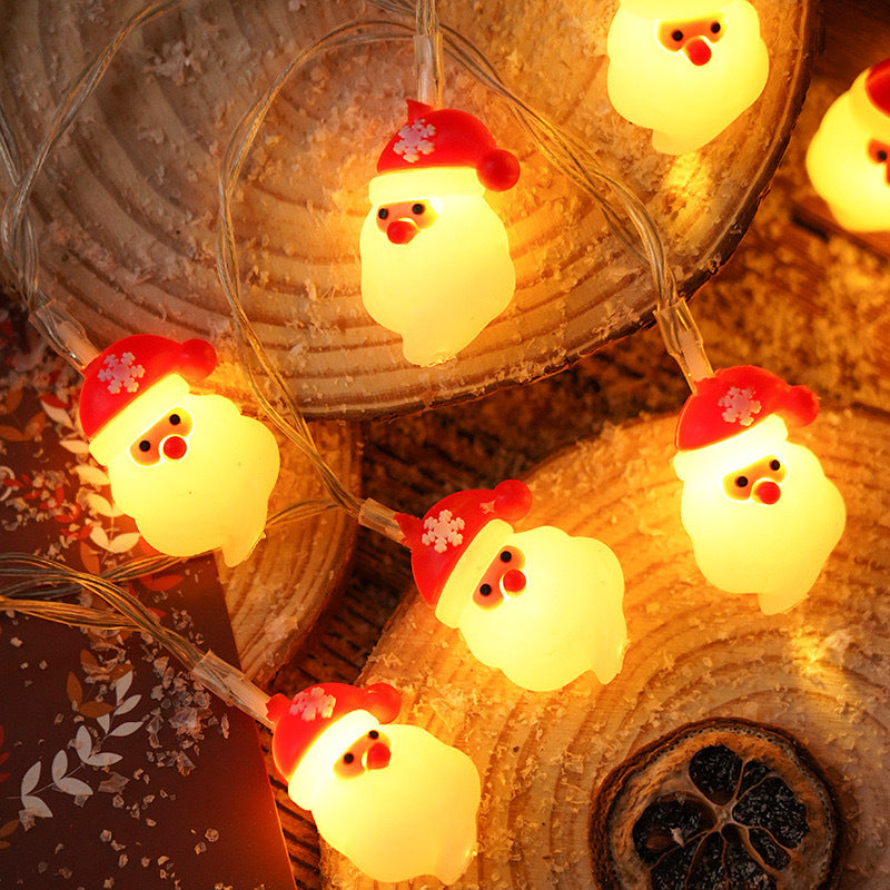 Christmas decoration, colorful lights, flashing lights, string lights, elderly people, snowmen, LED light string, evening scene, Christmas tree arrangement