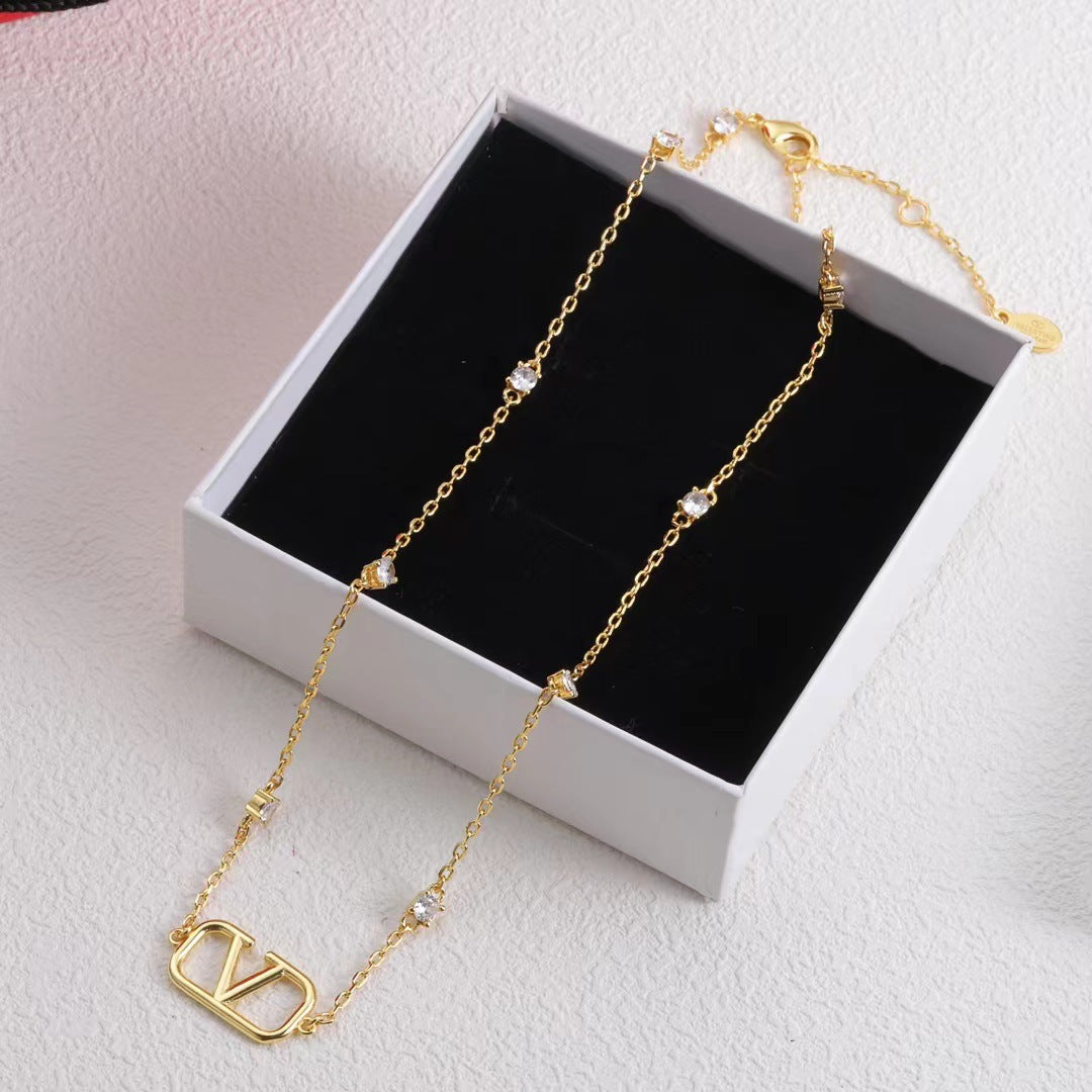 V-Letter Rhinestone Necklace – Gold Tone