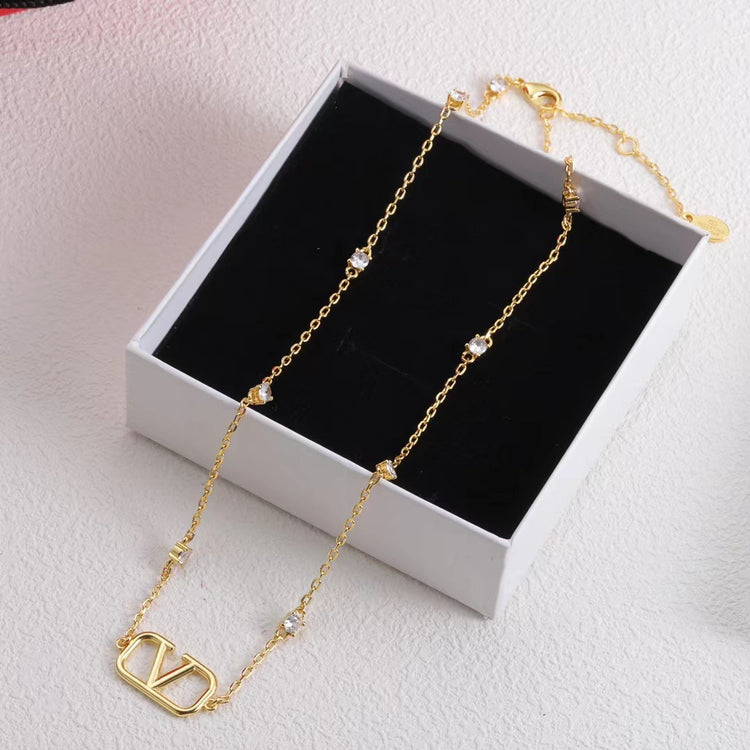 V-Letter Rhinestone Necklace – Gold Tone