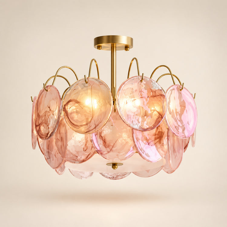 Luxury pink glass chandelier with gold finish and layered decorative glass panels.